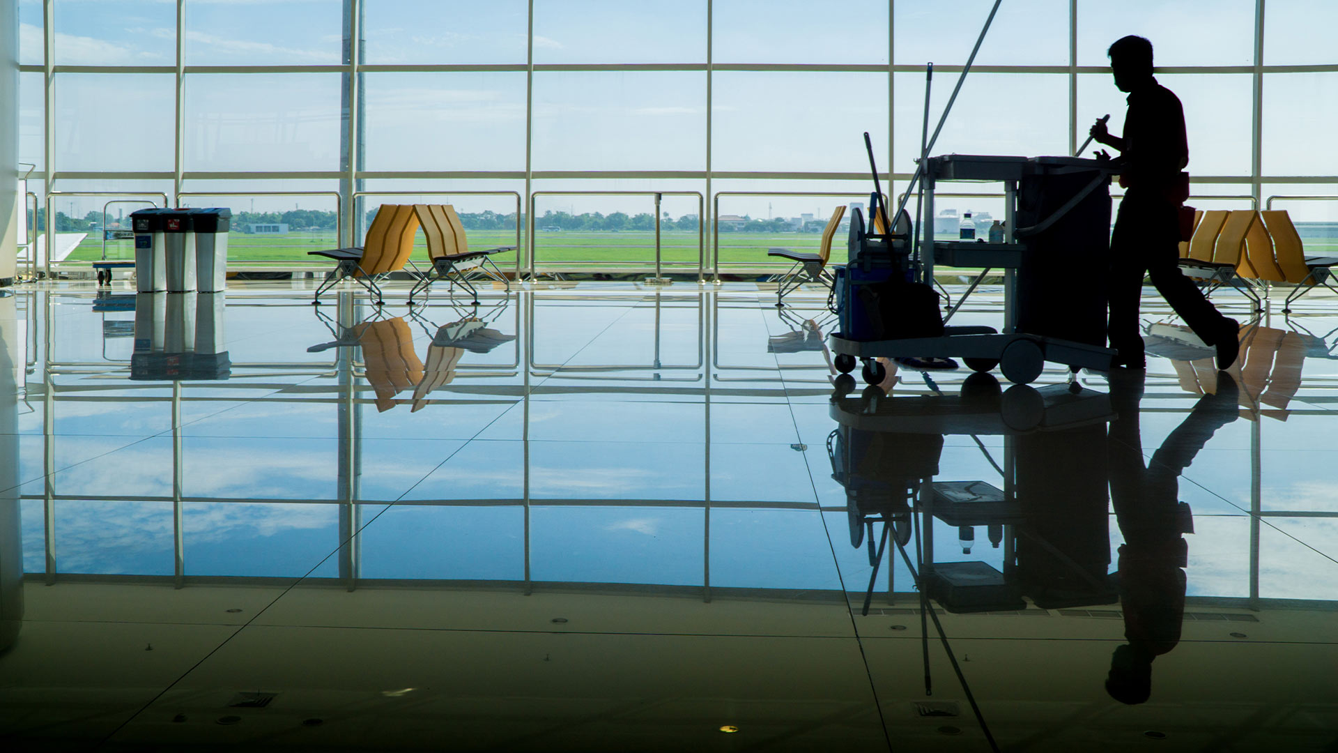 janitor in front of windows taunton ma